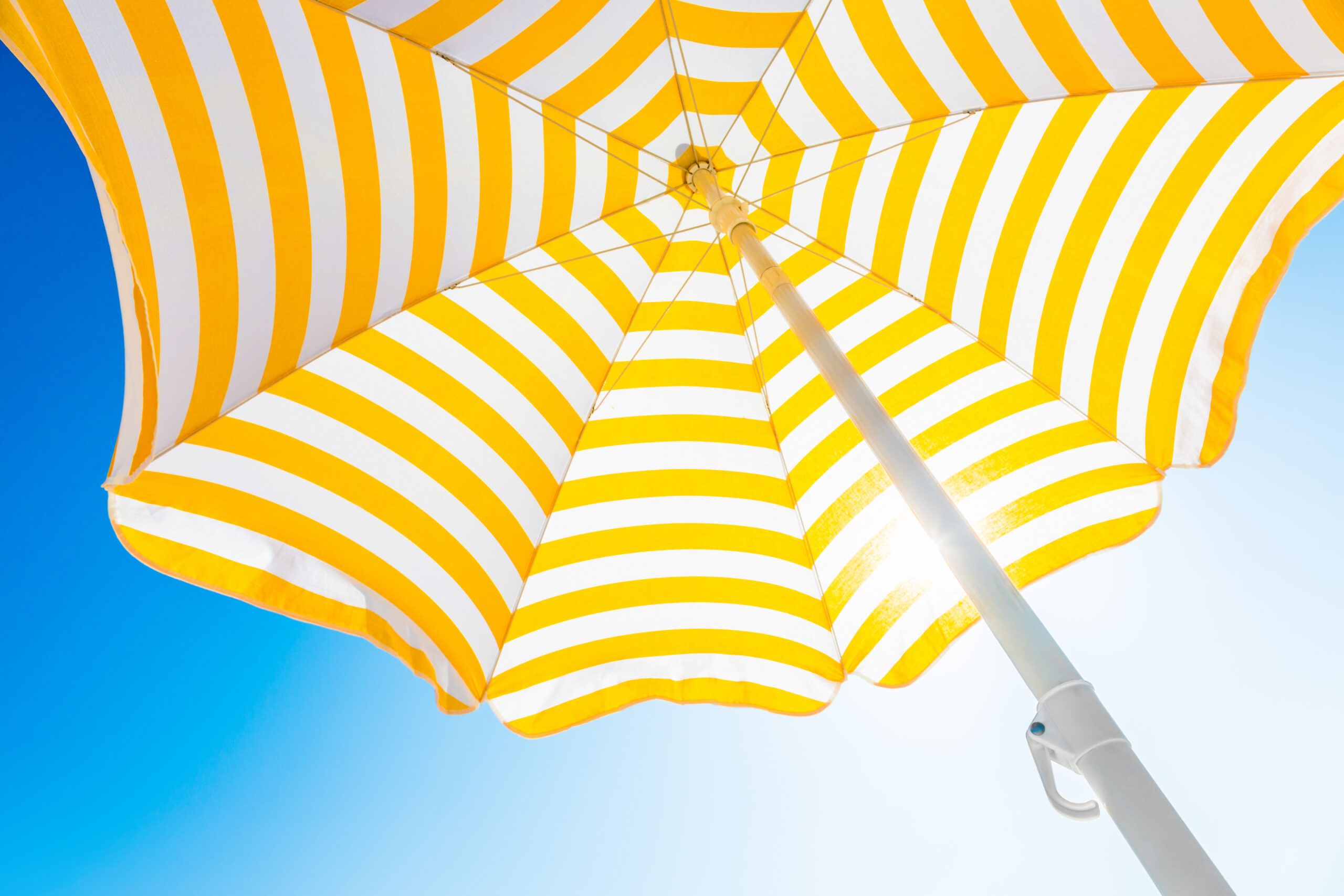 Beach Umbrella vs. Sunscreen And the Winner Is… Wellness Letter